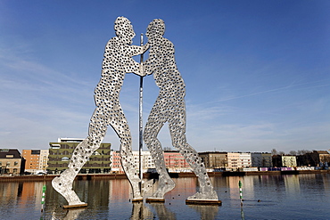 Molecule Man, monumental metal sculpture in the Spree river, human figures with holes, Treptow district, Berlin, Germany, Europe