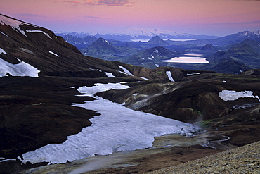 View across the Joekultungur area towards lake Alftavatn and Eyjafjallajoekull glacier as seen from Kaldaklofsfjoell mountain, Laugavegur hiking trail, Fjallabak Nature Reserve, Highlands of Iceland, Europe