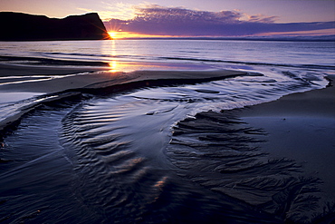 Sunset on the estuary of Horna creek in Hloeï£¿uvik bay, Hornstrandir peninsula, a hikers' paradise, West Fjords, Iceland, Europe