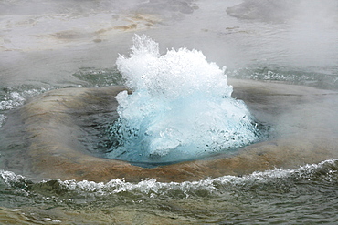 Strokkur Geyser shortly before eruption, geothermal region of Haukadalur, Geysir, Iceland, Europe