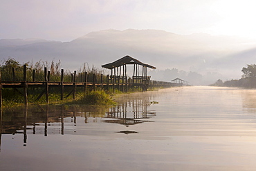 Boardwalk with boathouse in the early morning light, Inle Lake, Bagan, Myanmar, Burma, Southeast Asia, Asia