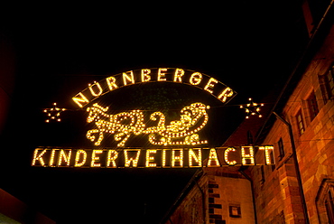 Illuminated entrance sign to the Nuernberger Kinderweihnacht children's Christmas market, Nuremberg, Bavaria, Germany, Europe