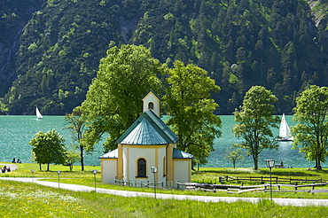 Chapel and sailing boats on Lake Achensee, Achenseekopf, Tyrol, Austria, Europe