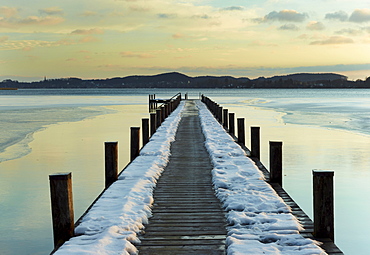 Jetty at sunrise on Lake Woerth in winter, Upper Bavaria, Bavaria, Germany, Europe