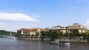 View across the Vltava River towards the historic town centre, with the Rudolfinum, the concert hall of the Czech Philharmonic Orchestra, and the Academy of Art, Prague, Czech Republic, Europe