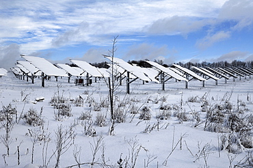 Snow-covered photovoltaic plant, Oberruesselbach, Middle Franconia, Bavaria, Germany, Europe