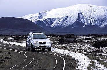 Vehicle travelling in the snowy highlands near Askja, Iceland, Europe