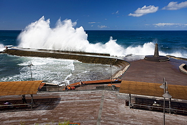 High waves breaking at the sea water swimming pool in Bajamar, Tenerife, Spain, Europe