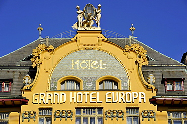 Art Nouveau statues on the gable of the Grand Hotel Europa, Wenceslas Square, Prague, Bohemia, Czech Republic, Europe