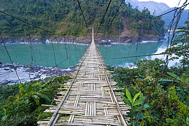 Long suspension bridge made of palm wood spanning the Siang River, Arunachal Pradesh, North East India, India, Asia