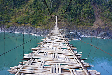 Long suspension bridge made of palm wood spanning the Siang River, Arunachal Pradesh, North East India, India, Asia