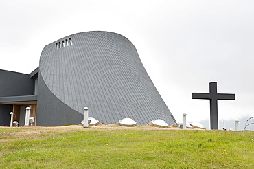 Modern church, concrete construction, with a large cross, new parish church, Bloenduos, Blonduos, Iceland, Scandinavia, Northern Europe, Europe