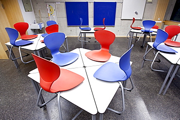 Chairs on desks in a classroom in a school in Straubing, Bavaria, Germany, Europe