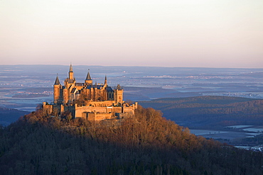 Early morning at the Burg Hohenzollern castle from the Zeller Horn, Swabian Alb near Hechingen, Baden-Wuerttemberg, Germany, Europe