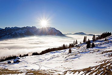 Appenzell region, Alpstein massif and an alpine pasture as seen from Faehnerenspitze mountain, low stratus and thaw, Swiss Alps, Switzerland, Europe