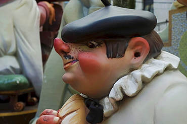 Basque man with a stuck-up nose wearing a beret, crude carnival characters and satirical sculptures at a parade, Fallas festival, Falles festival in Valencia in early spring, Spain, Europe