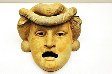 Comedy mask of a boastful young man from 200 BC., Asia Minor terracotta, antique collection, Koenigsplatz square, Munich, Bavaria, Germany, Europe