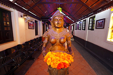 Swiss Cafe in Cochin, statue with welcoming flowers, Vypan, Ochanathuruthu, Kerala, India, Asia