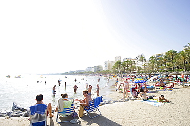 People on the beach, Marbella, Costa del Sol, Andalusia, Spain, Europe