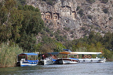 Boats on the lagoon, Rock Tombs of Kaunos, Dalyan, Lycia, Turkey, Asia