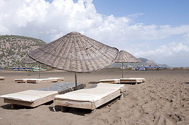 Sunbeds and sunshades on Iztuzu beach, Dalyan, Lycia, Turkey, Asia