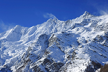 The three four-thousand-metre high mountain peaks, Taeschhorn mountain, 4491 m, Dom mountain, 4545 m, the highest mountain of Switzerland, and Lenzspitze mountain, 4264m, canton of Valais, Switzerland, Europe