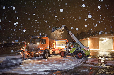 Winter services vehicles are loaded with road salt at the salt storage, motorway junction Stuttgart, Baden-Wuerttemberg, Germany, Europe