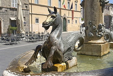 Bronze seahorse by Giorgio Paci, 1882, one of the four seahorses on the two fountains in Piazza Arringo, Ascoli Piceno, Marches, Italy, Europe