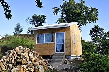 Earthquake-proof prefab home that was given to the victims of the January 2010 earthquake as part of a reconstruction programme by an international aid organisation, Palmiste-a-Vin, Leogane, Haiti, Caribbean, Central America