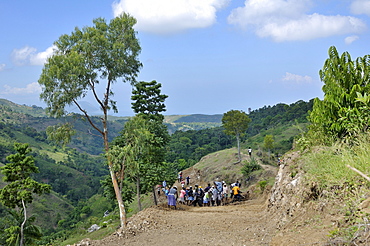 Inhabitants of a mountain village building a road with the assistance of an aid organisation, they want to link their village to the main road to allow economic development in the community, Bordes, Leogane, Ouest Department, Haiti, Caribbean, Central Ame