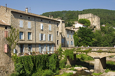 City of Largentiere, houses along the La Ligne River, in the back the Bishop's castle, Rhones Alpes, France, Europe