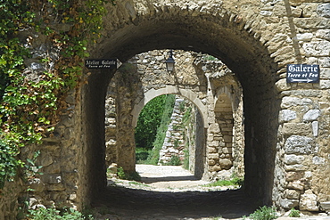 Covered passage and paved street, medieval village of Saint Montant, Ardeche, Rhones Alpes, France, Europe