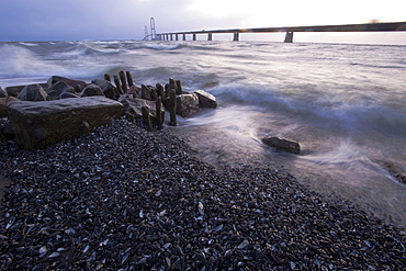 Baltic Sea beach and surf at Store Belt, Great Belt Bridge, Nyborg, Korsor, South Denmark, Denmark, Europe