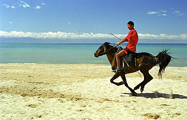 Young rider on a horse, Kazakhstan.