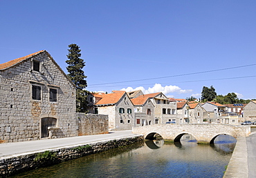 Bridge over the river in the historic town centre, Vrboska, Hvar Island, Croatia, Europe