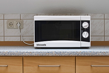 Microwave on a kitchen counter