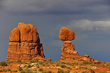 Balanced Rock, rock formation, evening mood, thunderstorm clouds, Arches National Park, Moab, Utah, Southwestern United States, United States of America, USA