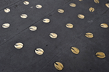 Sponsors names immortalized in bronze hoofprints of Rachel, the unofficial mascot, a lucky pig made of bronze, at the entrance of Pike Place Public Market, Seattle, Washington, USA