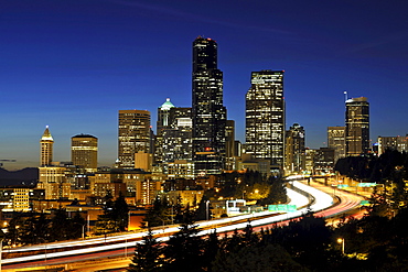 Night shot, Interstate 5 motorway in front of thw skyline of the Financial District in Seattle, Columbia Center, formerly known as Bank of America Tower, Washington Mutual Tower, Two Union Square Tower, Municipal Tower, formerly Key Tower, Smith Tower, Se