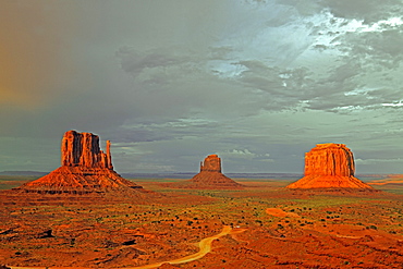 The Mitten Buttes in the last light during a storm, Monument Valley, Arizona, USA