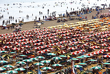 Parasols and sun loungers, mass tourism on the beach of Caorle, Adriatic Sea, Italy, Europe