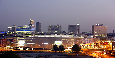 Skyline of Essen and Limbecker Platz shopping center, completed in 2009, Essen city centre, illuminated facade on Berliner Platz square, Essen, North Rhine-Westphalia, Germany, Europe