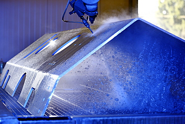 Water jet technology, precise technology for cutting metal with a high pressure water jet, where an abrasive material is added to the water, Waterjet company, Aarwangen, Switzerland, Europe