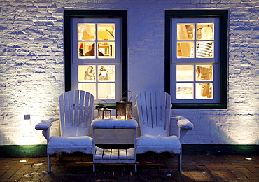 Snow-covered chairs in front of a shop, East Frisian North Sea island of Spiekeroog, Lower Saxony, Germany, Europe