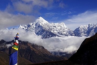 Mt. Kangtega in clouds and Mt. Thamserku, on the right Mt. Kusum Kanguru, Khumbu, Sagarmatha National Park, Nepal, Asia