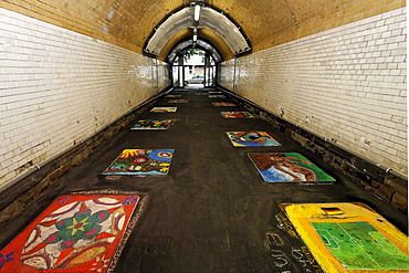 Pedestrian tunnel with chalk drawings on the ground, painted by children, disused Suedbahnhof railway station, Krefeld, North Rhine-Westphalia, Germany, Europe