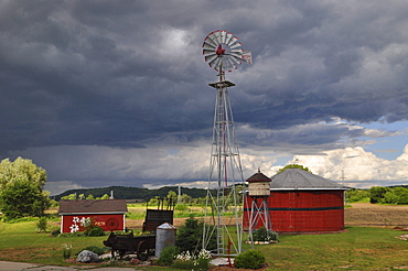 Storm brewing above a farm, Wisconsin, USA