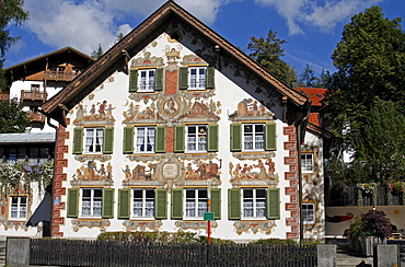 Building facade with "Lueftlmalerei" mural paintings, windows and shutters, Haensel und Gretel Heim, Oberammergau, Bavaria, Germany, Europe