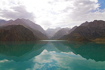 Turquoise Alexander lake in the Fan Mountains, Iskanderkul, Tajikistan, Central Asia