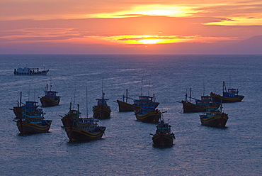 Ships in the harbour of Mui Ne in twilight, Vietnam, Asia